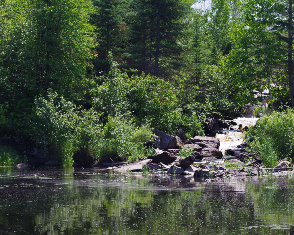 Rushing water over rocks, summer