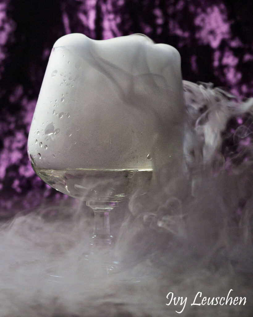 Fog flowing over edge of glass