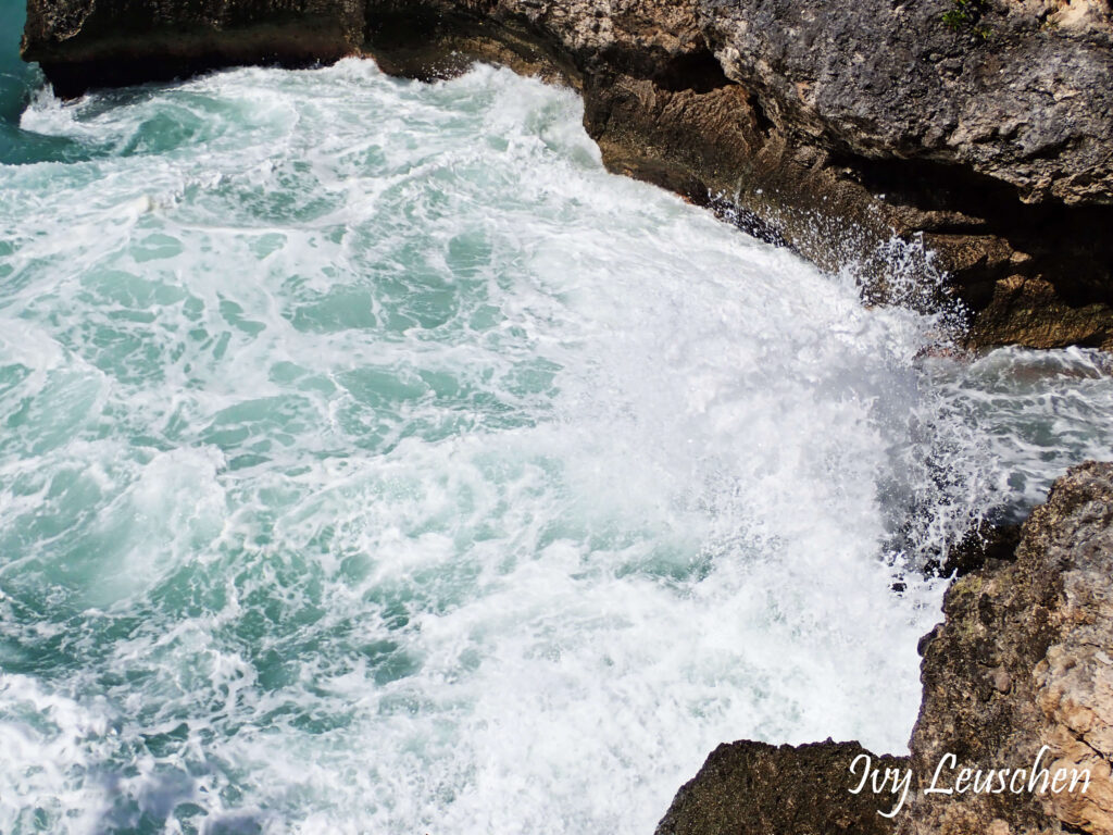 Water splashing against rocks