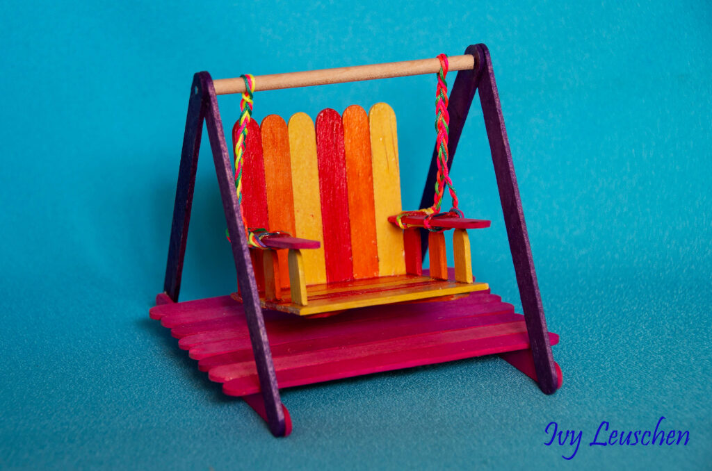 Colourful popsicle stick swinging chair